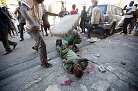 Click image for larger version. 

Name:	Haiti3%20Deadly%20Protest.jpg 
Views:	40 
Size:	48.5 KB 
ID:	21819